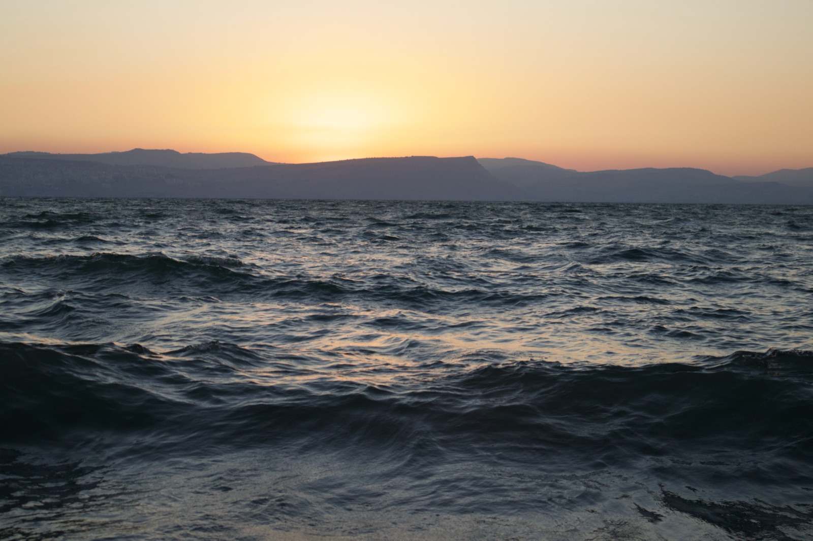 Kinneret at sunset, looking toward Mount Arbel